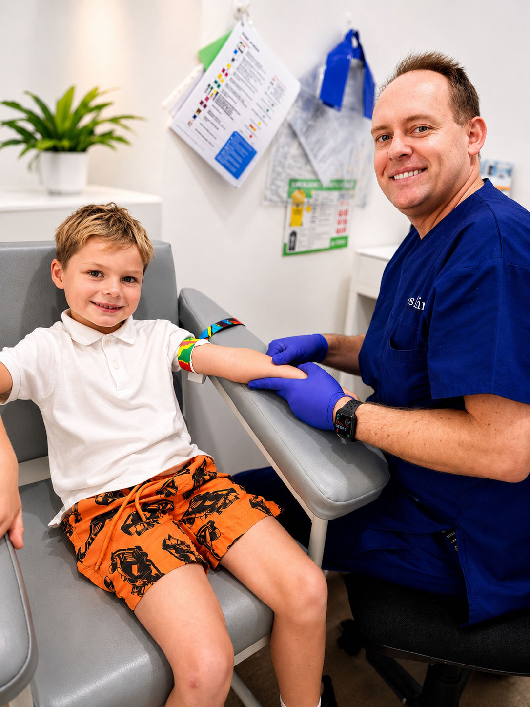 Smiling boy with Dr Louis Traynor before a blood test at the BRAVE Clinic, Shire Family Medical, Sutherland
